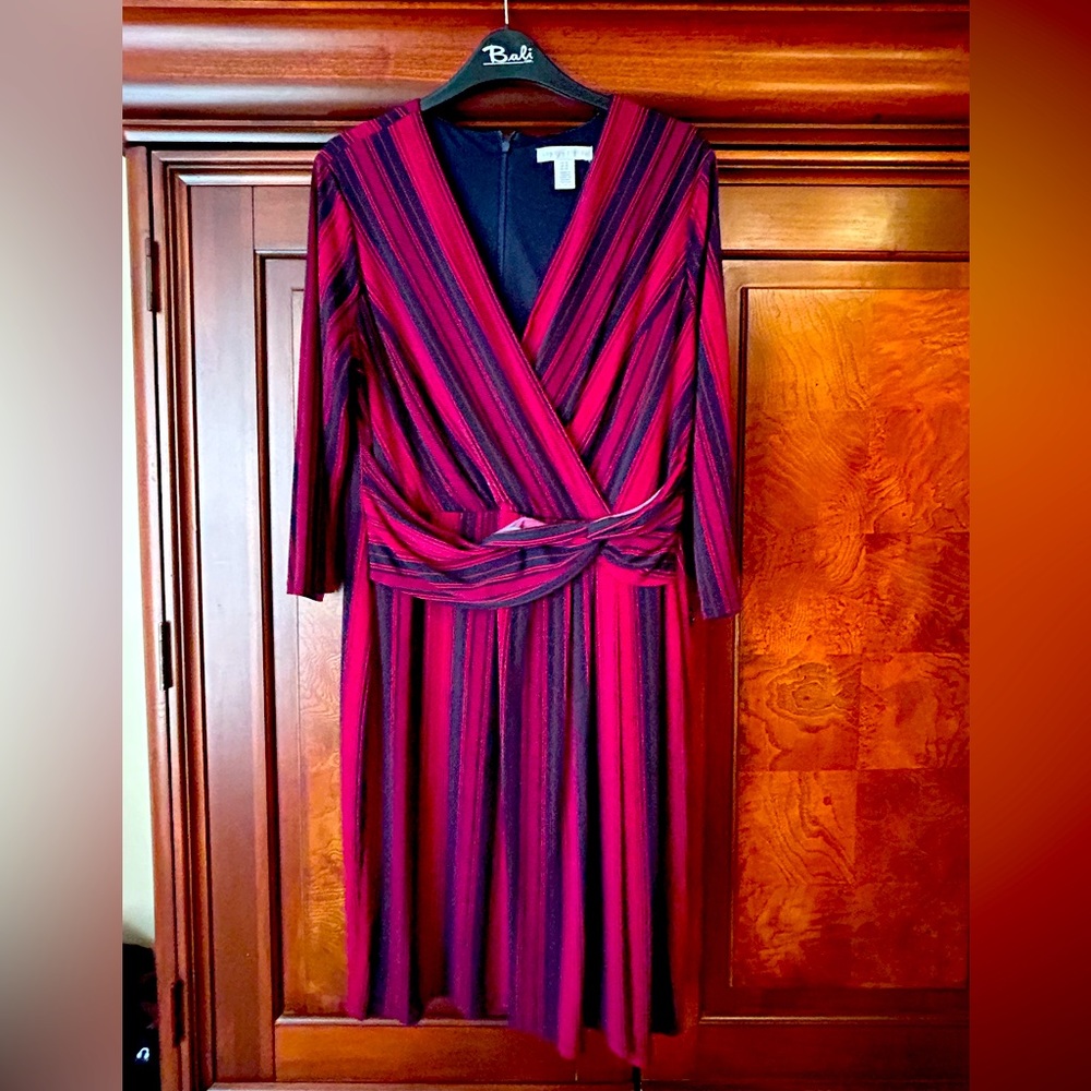 Worn one time. Navy blue and burgundy in color. 3/4 length sleeve.